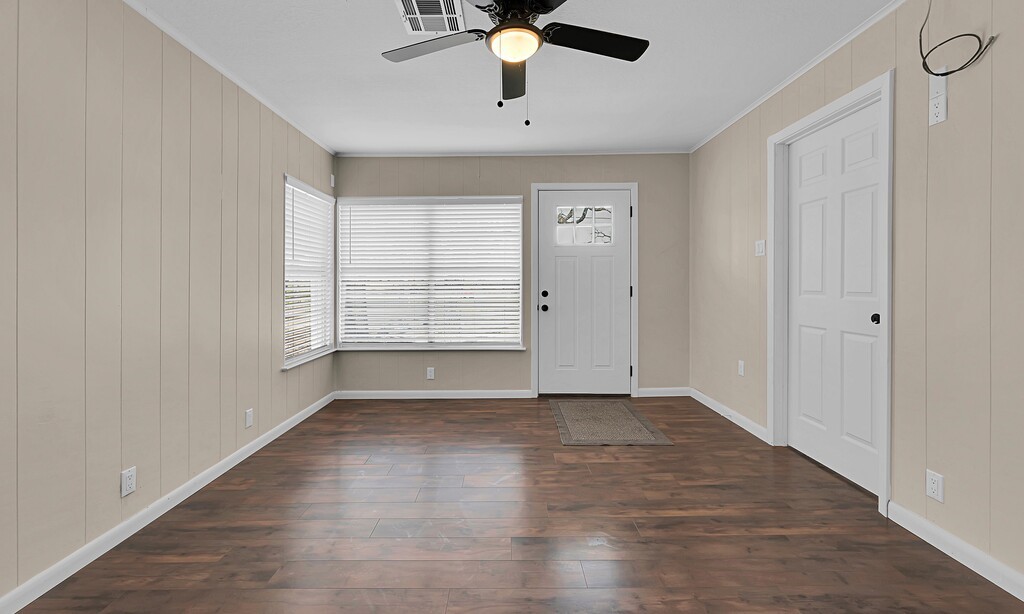 122 Teeling Trail Whitney, TX 76692 - Photo 28 of 31 wooden floor in an empty room with a window