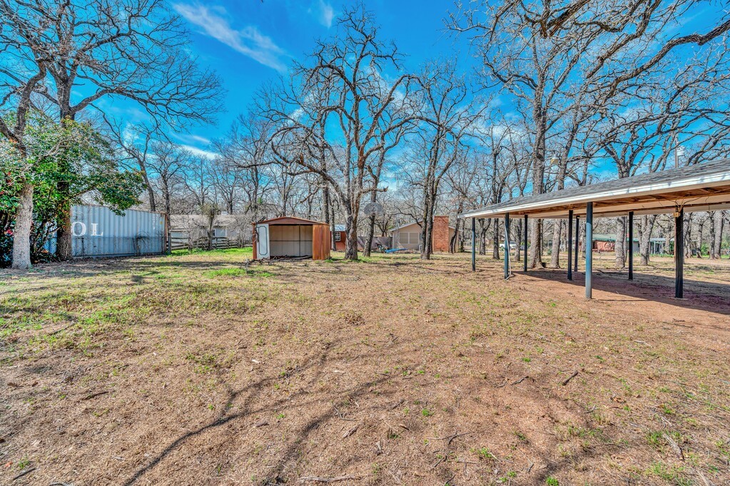 122 Teeling Trail Whitney, TX 76692 - Photo 5 of 31 a view of a house with a yard