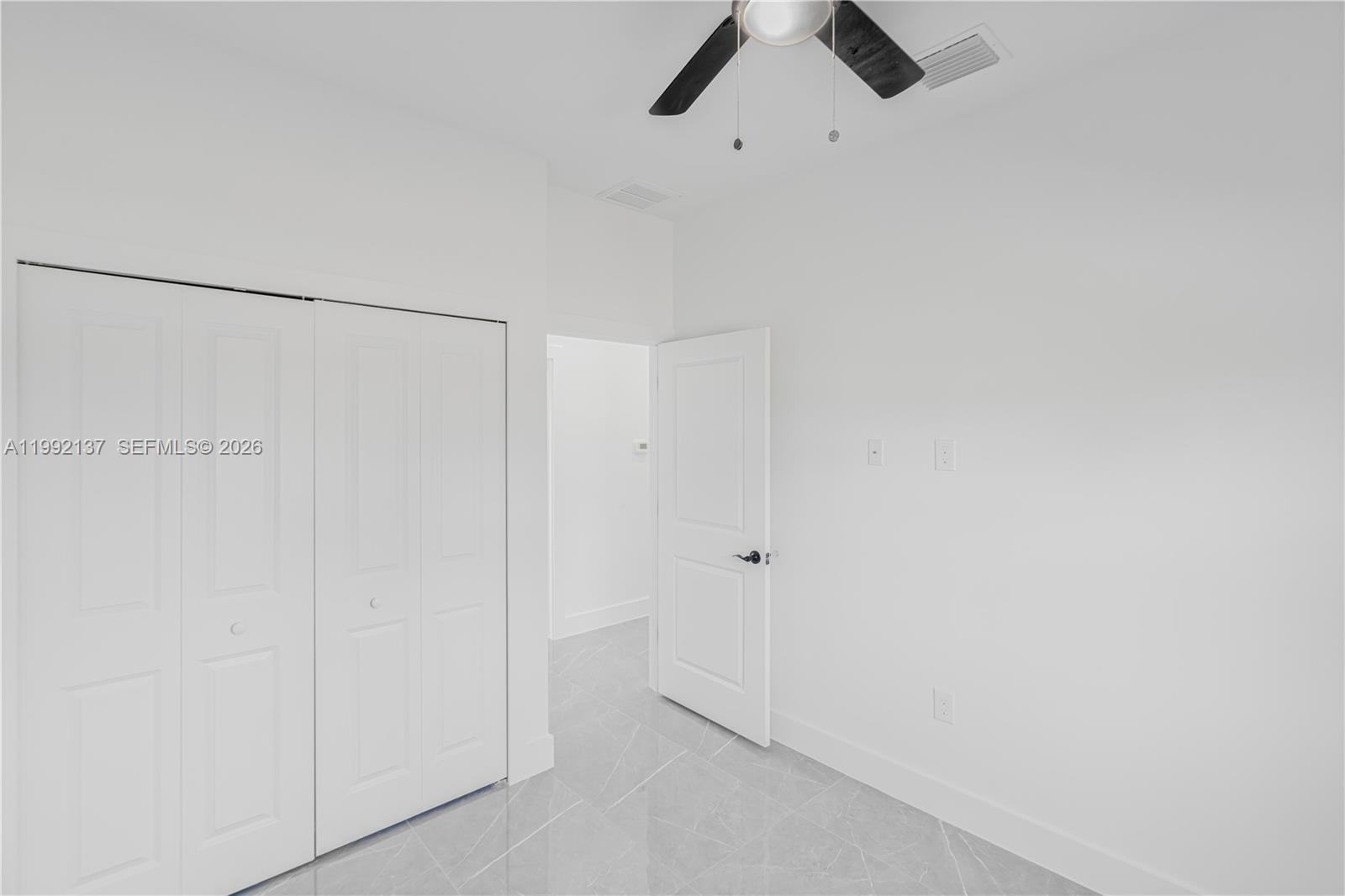 747 Roma Avenue South Lehigh Acres, FL 33974 - Photo 20 of 31 a view of an empty room