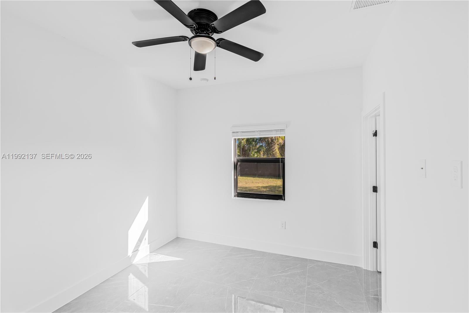 747 Roma Avenue South Lehigh Acres, FL 33974 - Photo 21 of 31 a view of an empty room