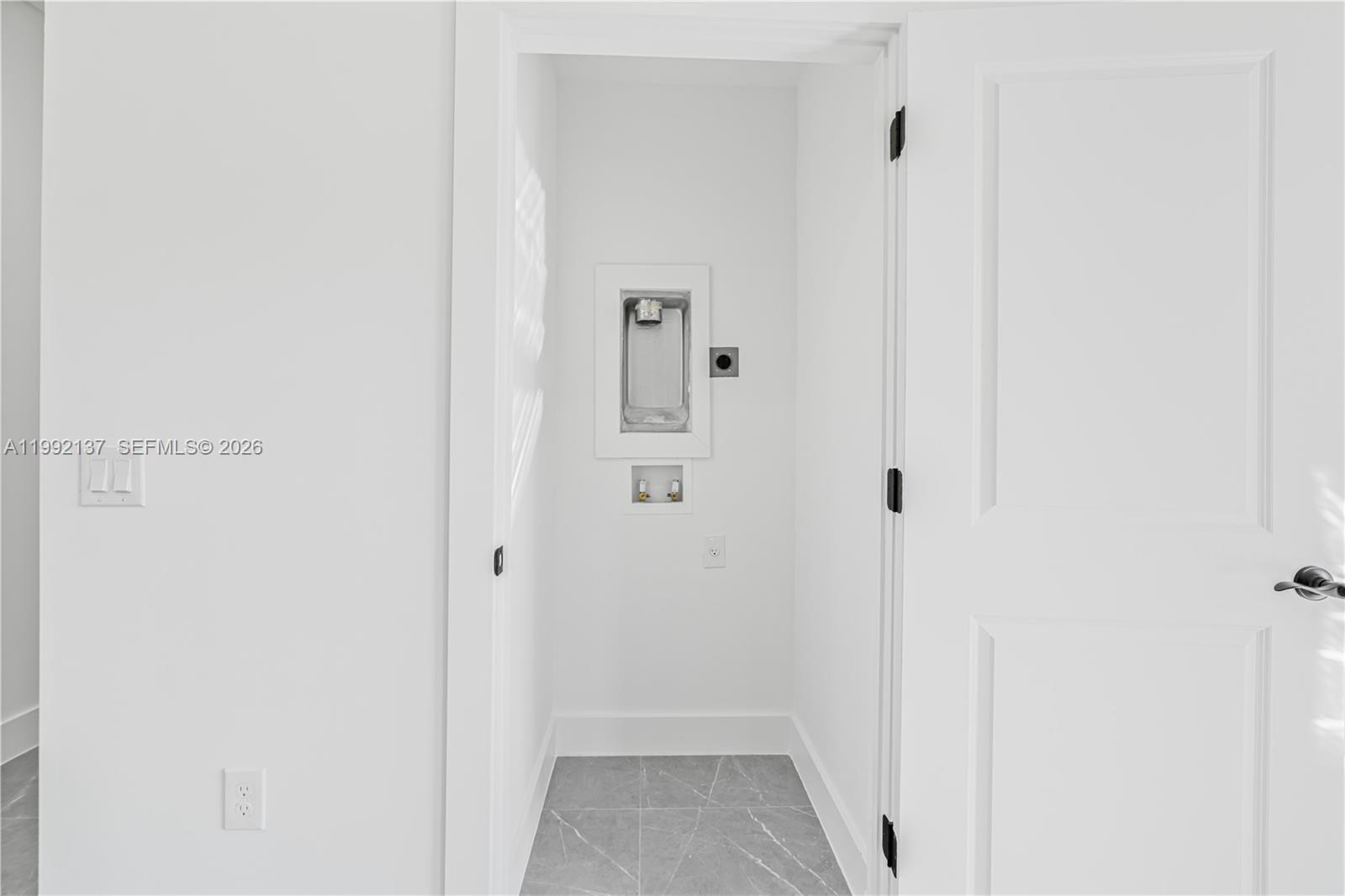 747 Roma Avenue South Lehigh Acres, FL 33974 - Photo 24 of 31 a view of a hallway