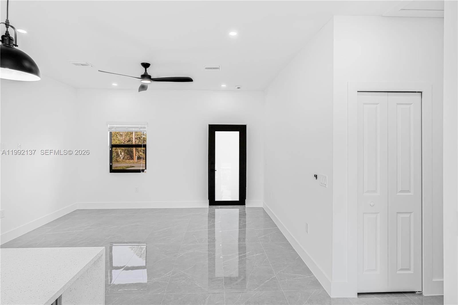 747 Roma Avenue South Lehigh Acres, FL 33974 - Photo 5 of 31 a view of an empty room