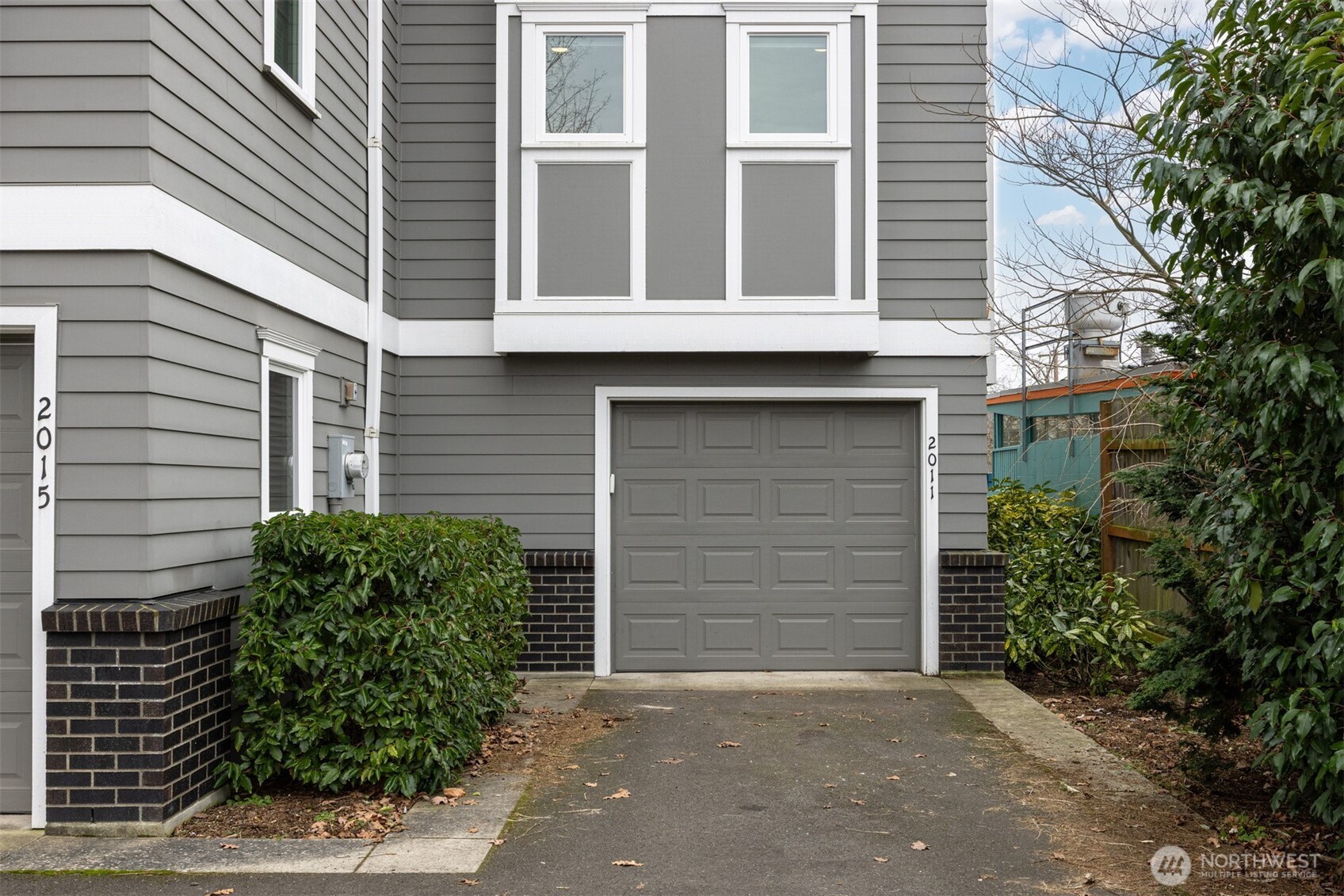 2011 Cornwall Avenue Bellingham, WA 98225 - Photo 23 of 30 a front view of a house with garage