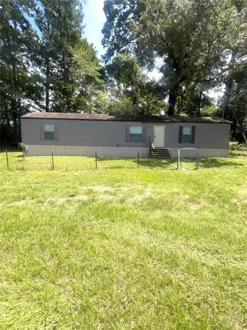 a view of swimming pool with an outdoor space and seating area