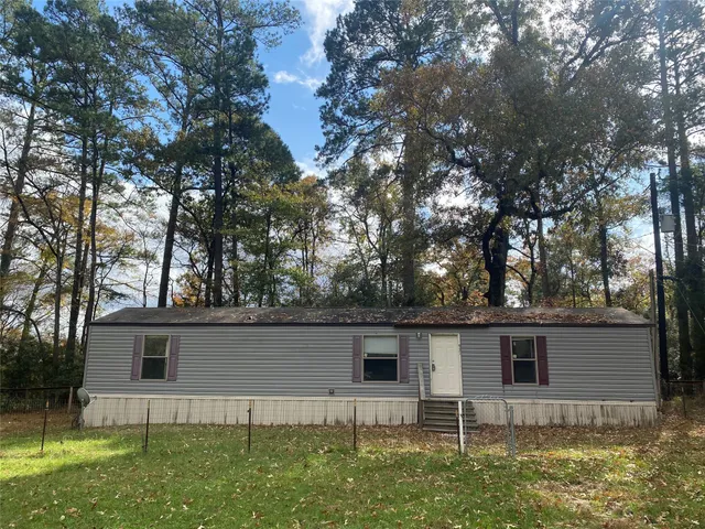 front view of house with a yard