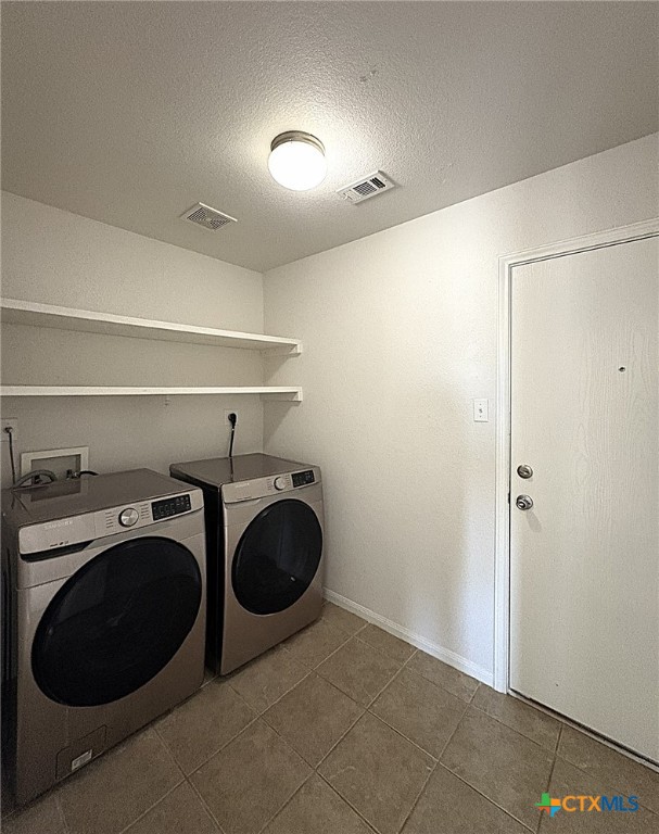 6502 Griffith Loop Killeen, TX 76549 - Photo 19 of 22 a utility room with dryer and washer