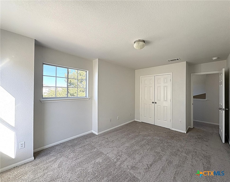 6502 Griffith Loop Killeen, TX 76549 - Photo 7 of 22 a view of an empty room with a window