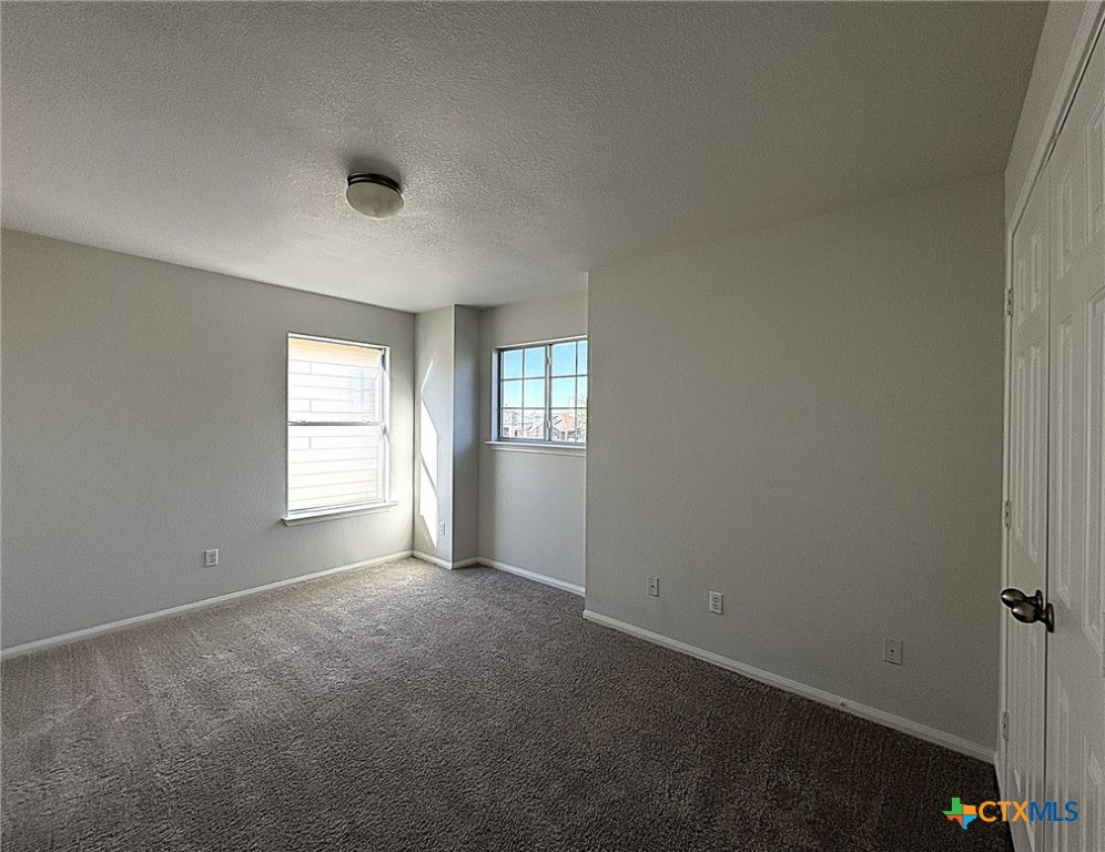6502 Griffith Loop Killeen, TX 76549 - Photo 8 of 22 an empty room with windows