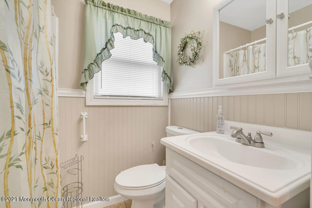 42 Harborage Avenue Bayville, NJ 08721 - Photo 24 of 35 a bathroom with a sink toilet and shower