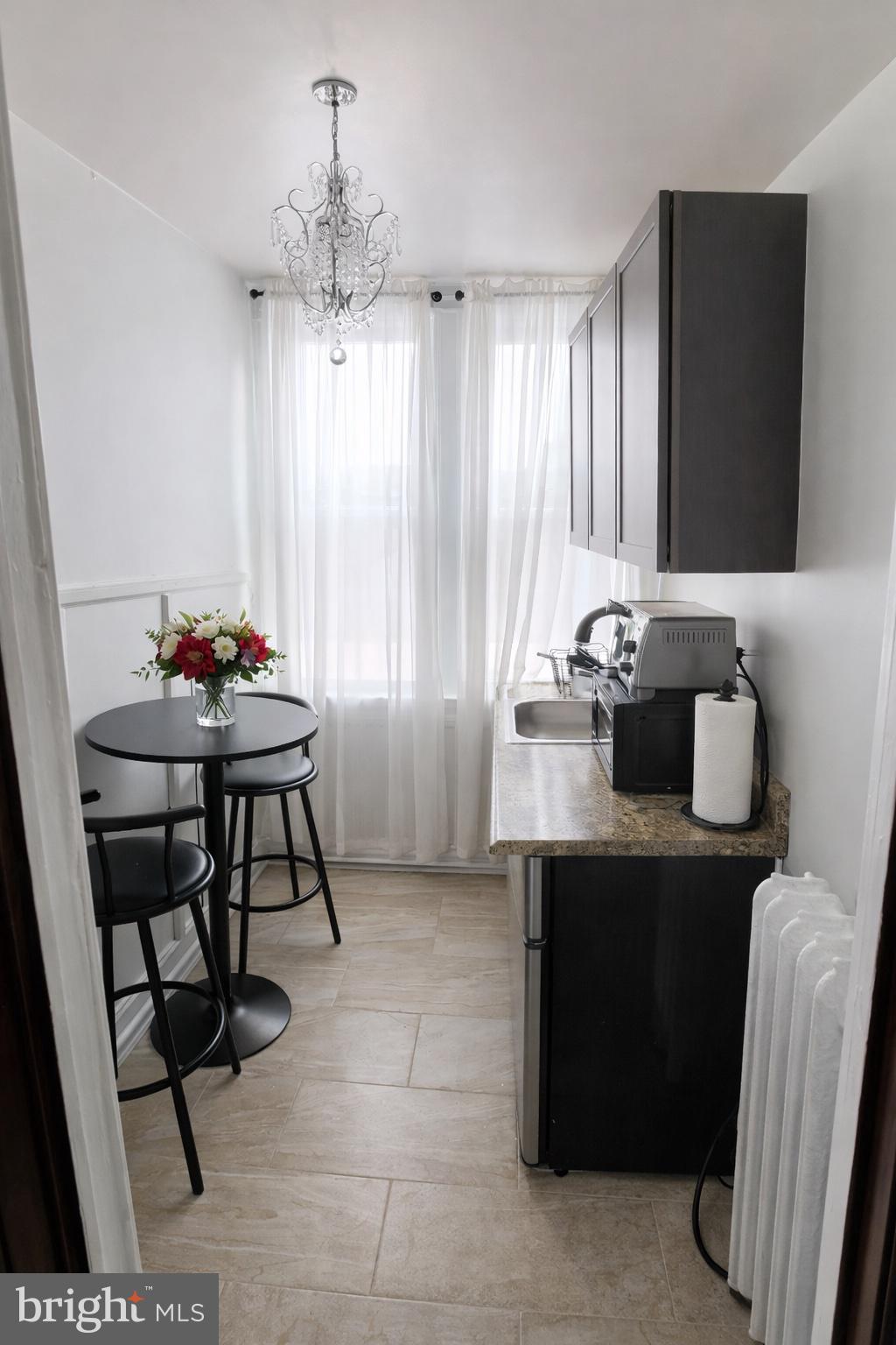 1122 Columbia Road Northwest Washington, DC 20009 - Photo 24 of 42 Third level kitchenette/wet-bar