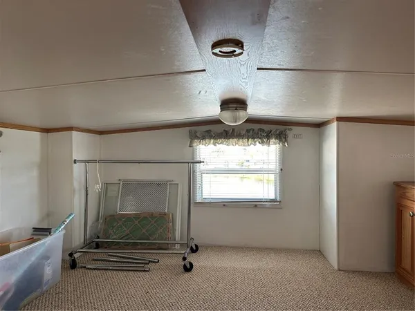 a view of a balcony and front door