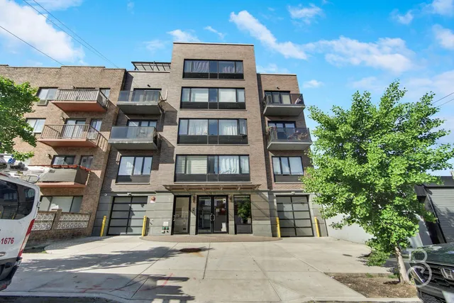 a bricked building with multiple windows