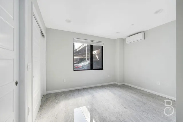 an empty room with windows