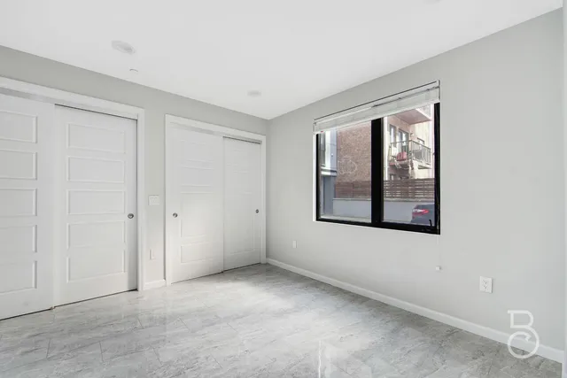 an empty room with windows