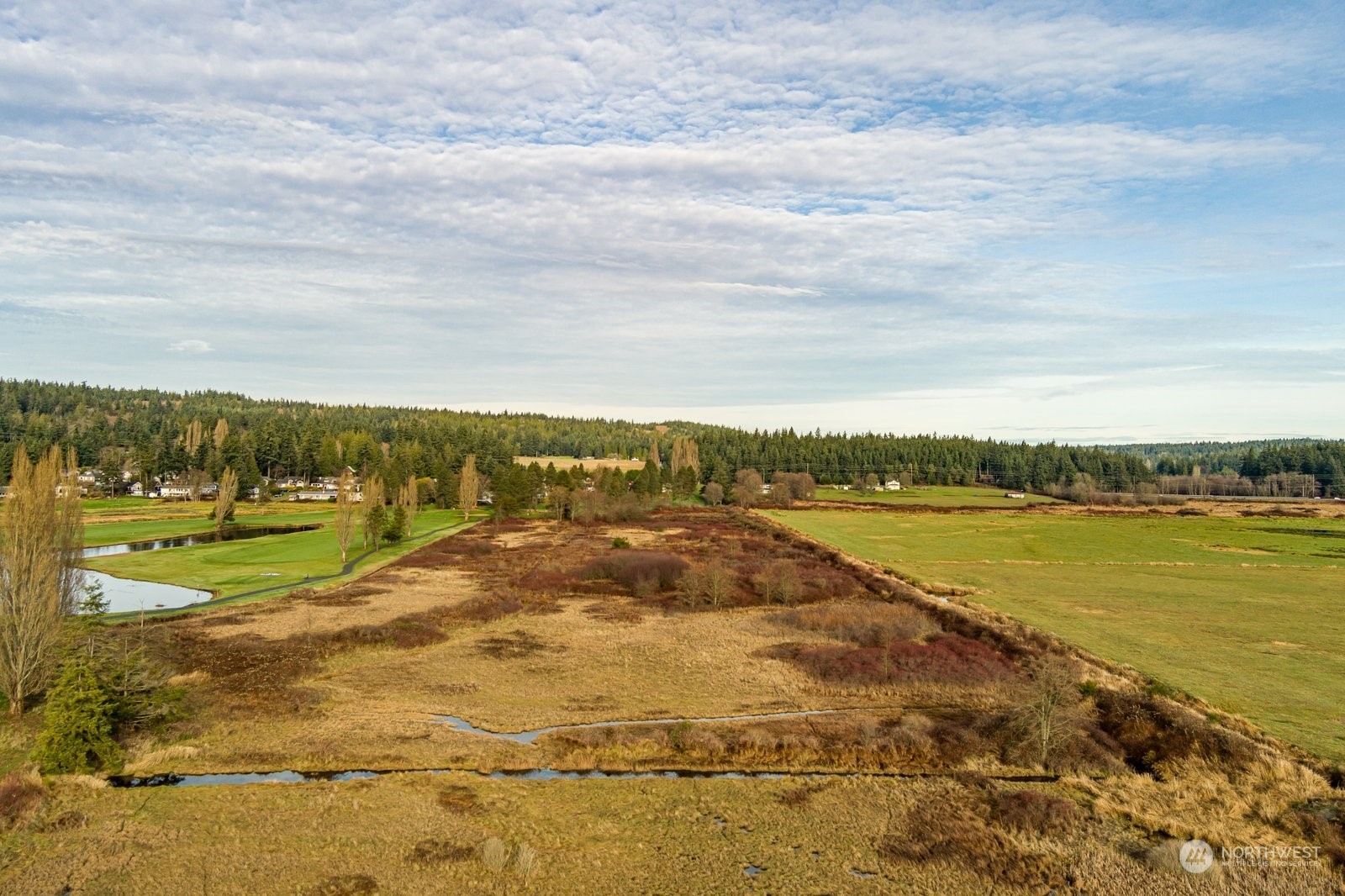 -xxx Bayview Road Langley, WA 98260 - Photo 3 of 13 a view of an ocean from a city