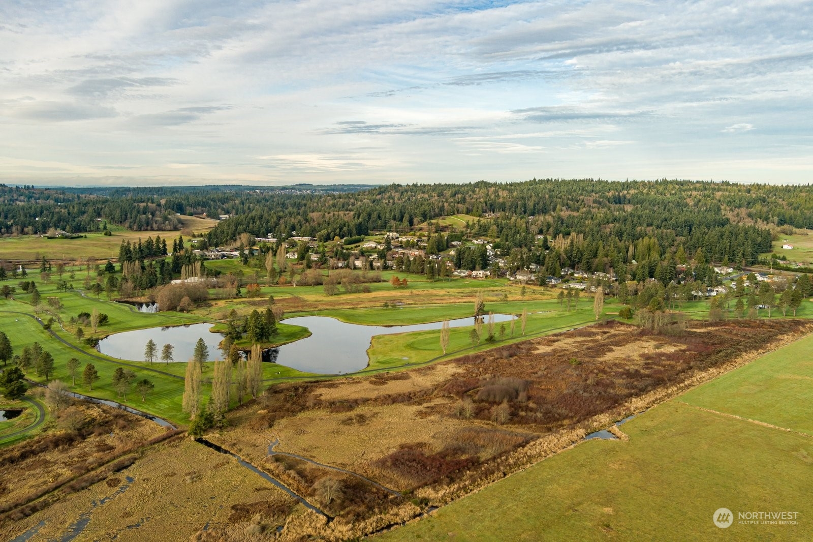 -xxx Bayview Road Langley, WA 98260 - Photo 6 of 13 a view of a lake with a houses