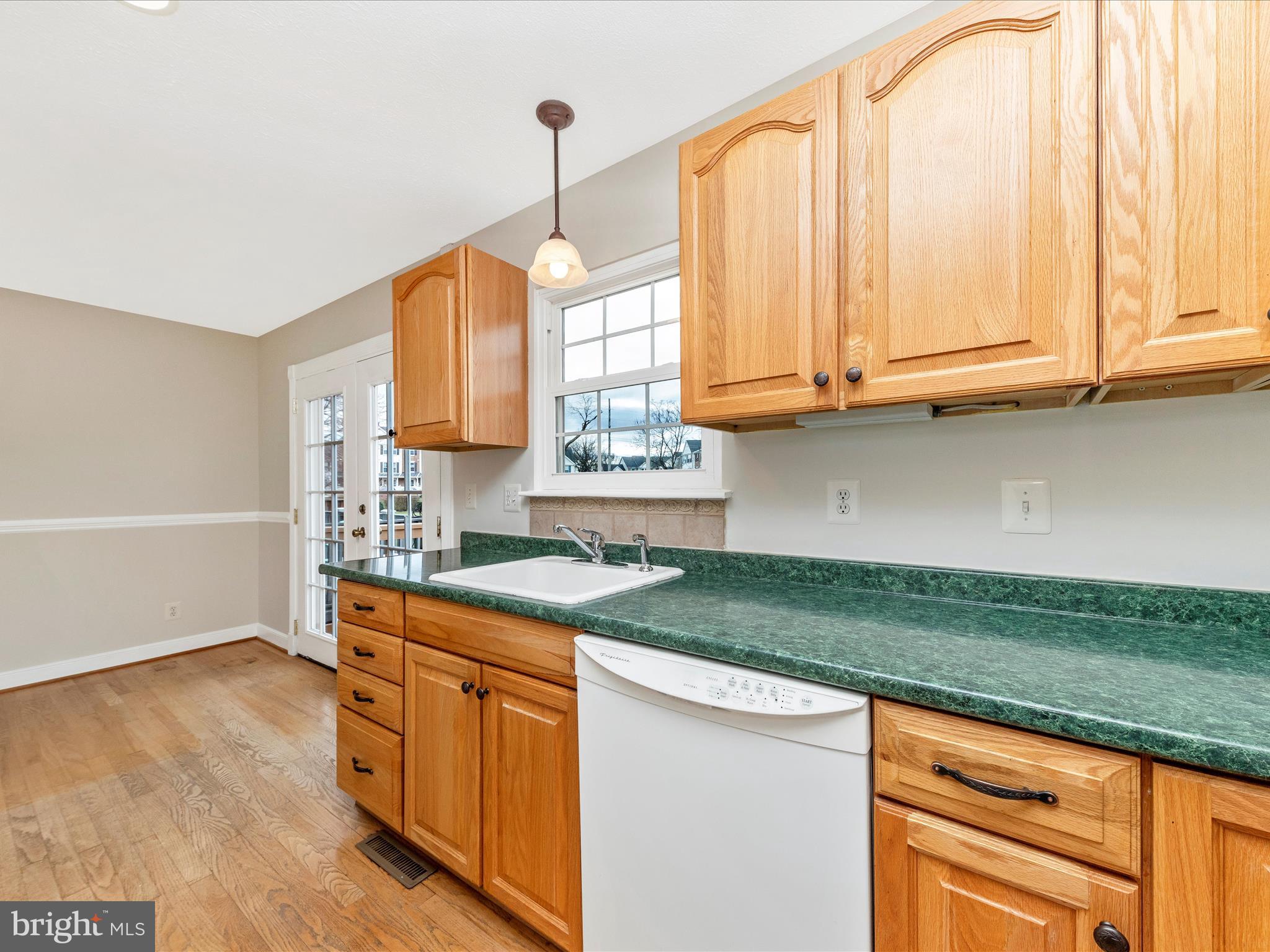 1116 Keswick Place Frederick, MD 21703 - Photo 14 of 53 a kitchen with a sink cabinets and window