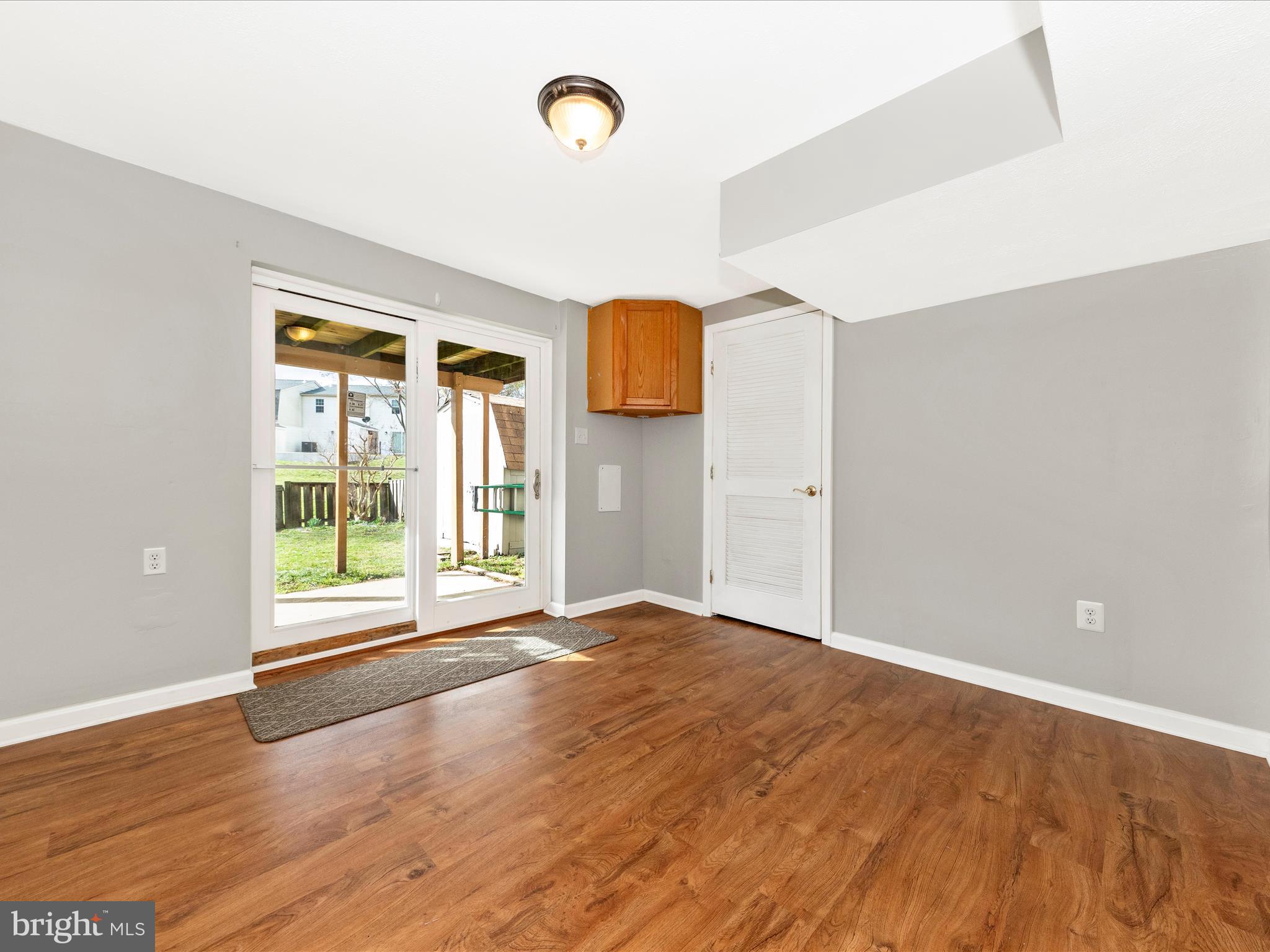 1116 Keswick Place Frederick, MD 21703 - Photo 35 of 53 wooden floor in an empty room with a window