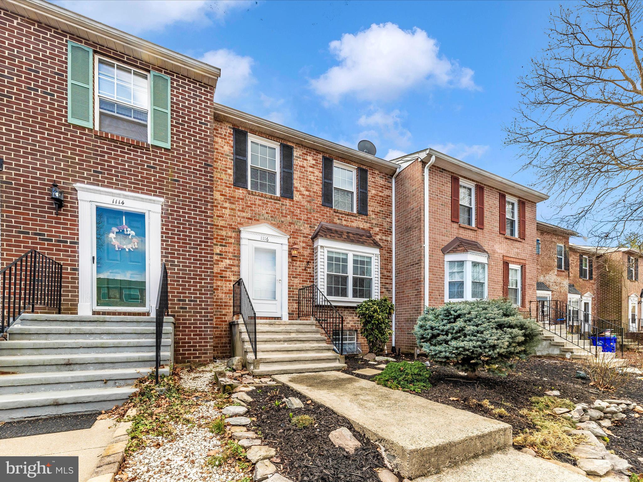 1116 Keswick Place Frederick, MD 21703 - Photo 39 of 53 a front view of a house with a yard