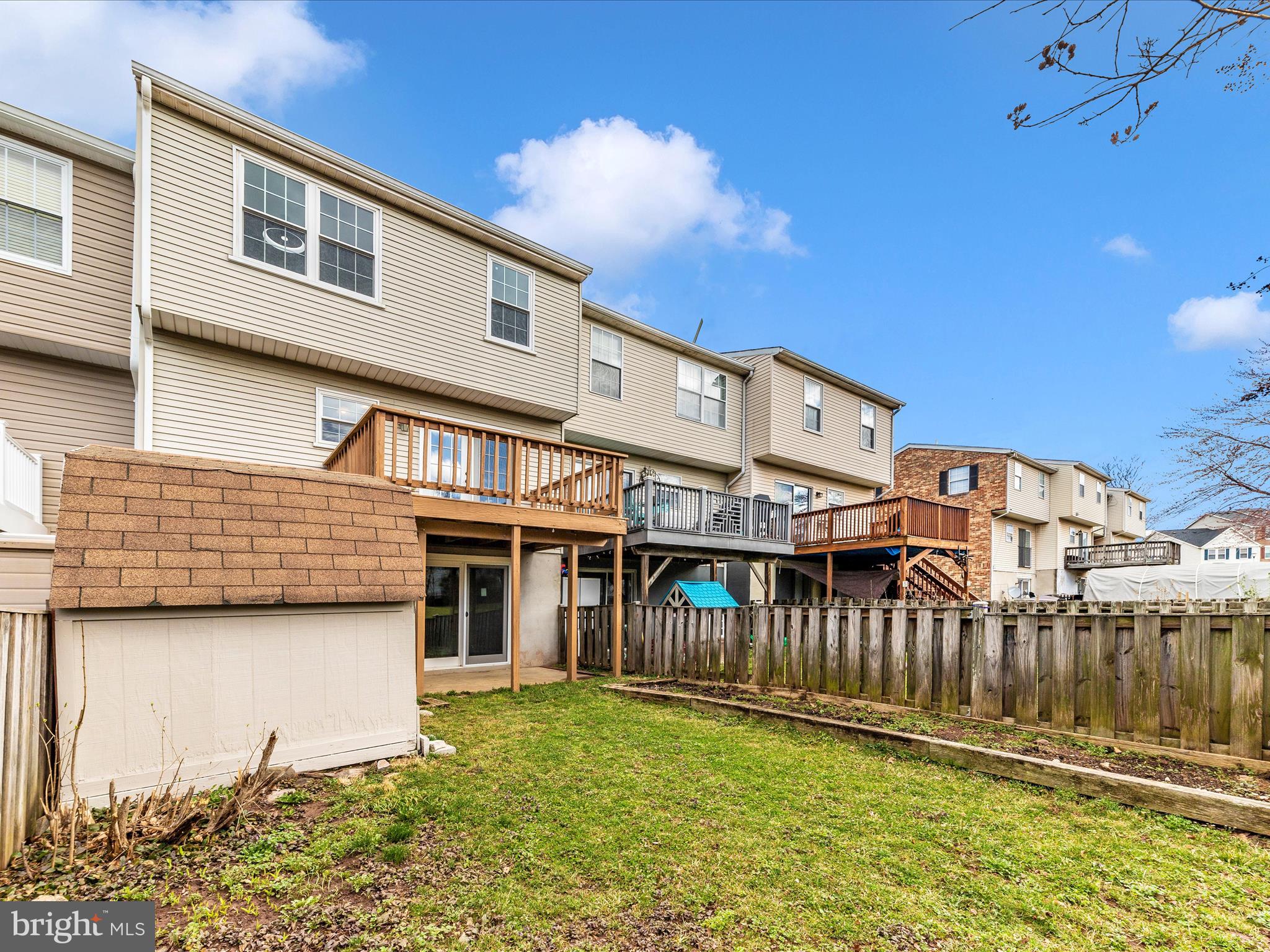 1116 Keswick Place Frederick, MD 21703 - Photo 45 of 53 a view of a house with a yard and sitting area