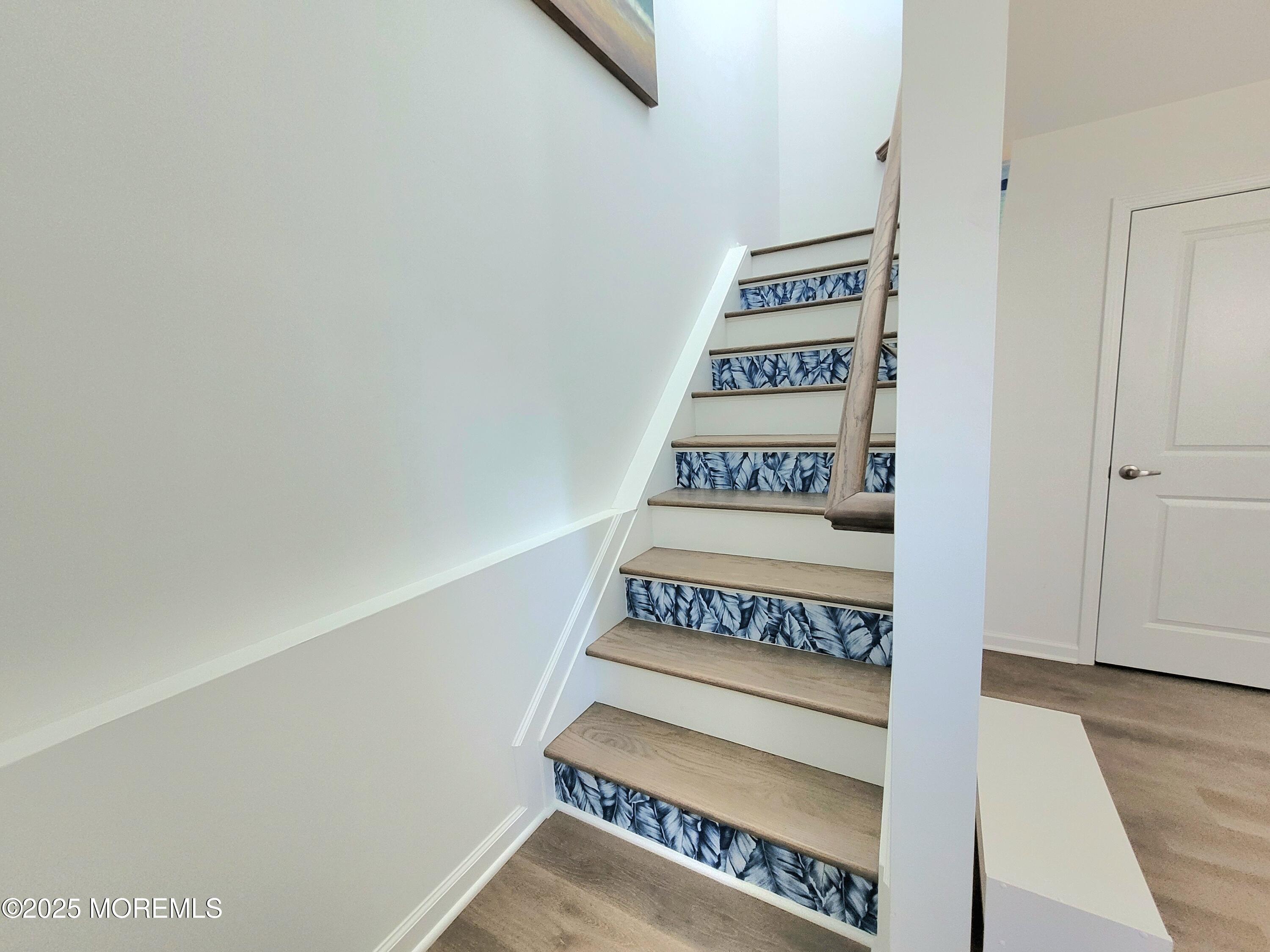 1134 Springwood Avenue, Unit B Asbury Park, NJ 07712 - Photo 3 of 19 a view of a bench in a hall