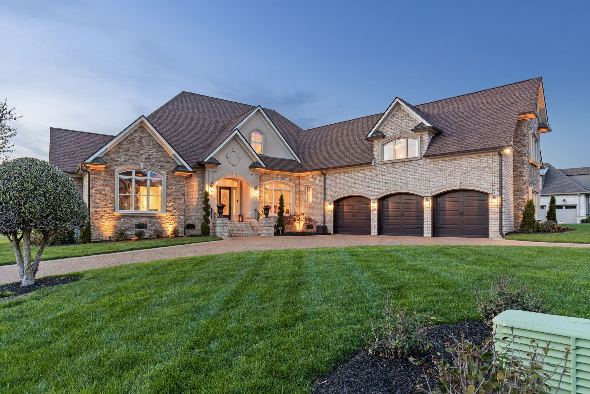 763 Plantation Way Gallatin, TN 37066 - Photo 2 of 65 a front view of a house with garden