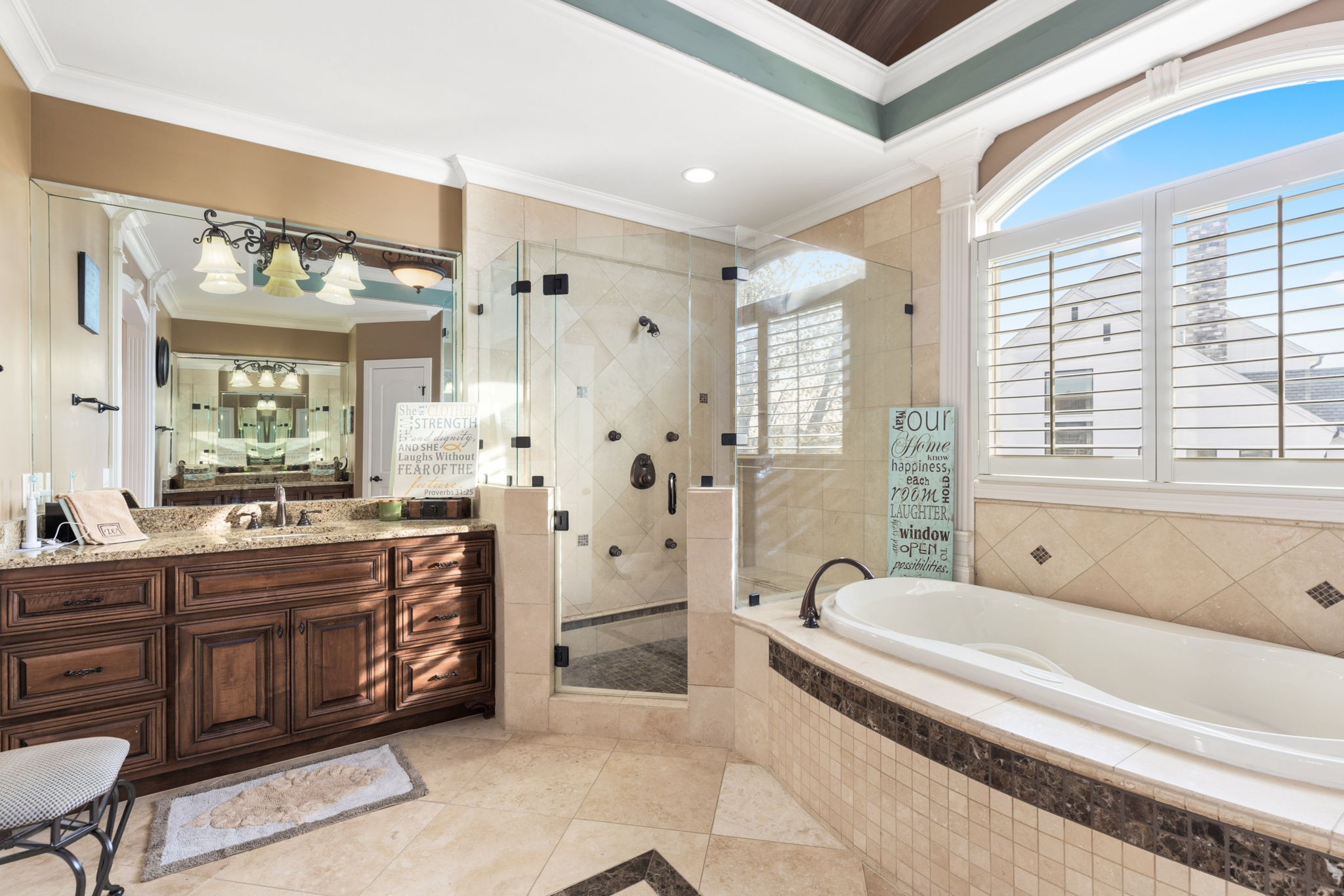 763 Plantation Way Gallatin, TN 37066 - Photo 27 of 65 a spacious bathroom with a tub a double vanity sink a mirror a shower and a large window