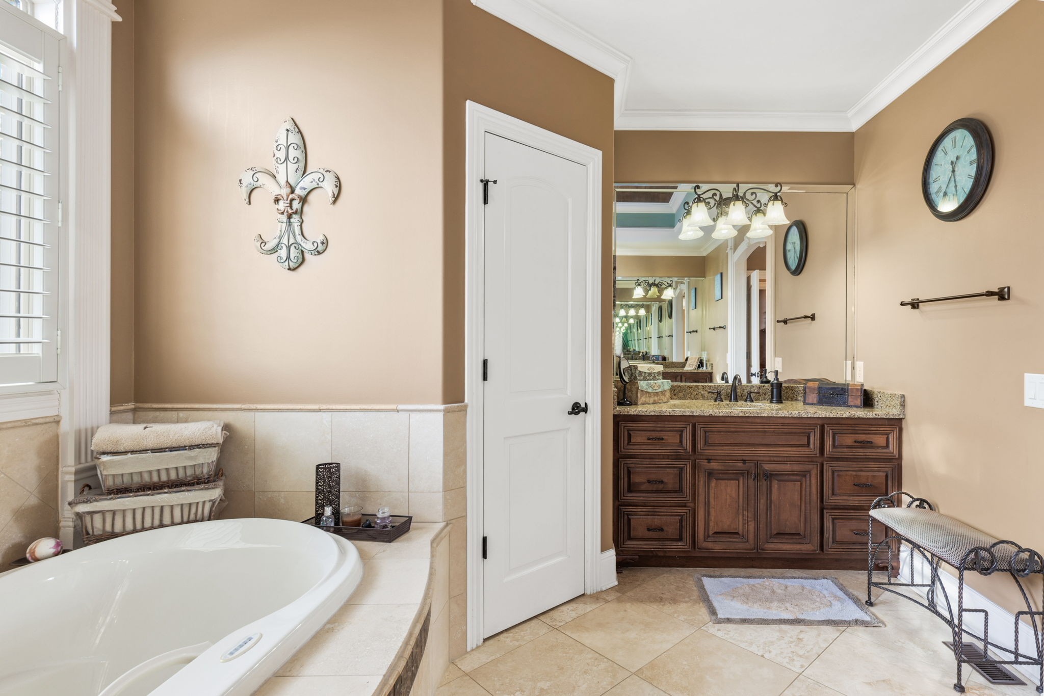 763 Plantation Way Gallatin, TN 37066 - Photo 28 of 65 a bathroom with a tub a double vanity sink and mirror