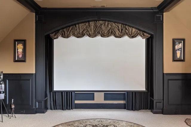a view of a house with backyard and porch