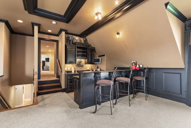 a view of a swimming pool with an outdoor seating