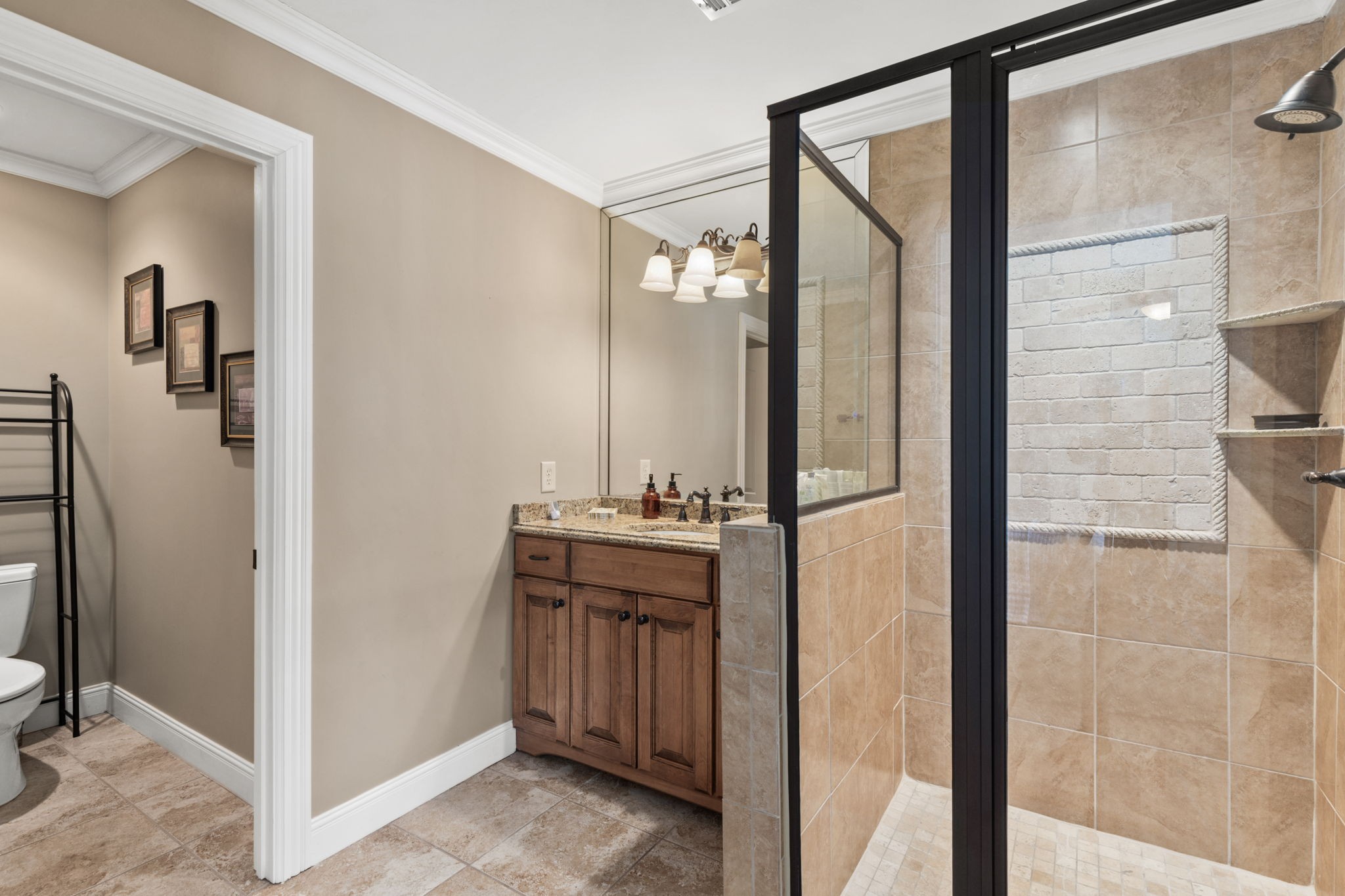 763 Plantation Way Gallatin, TN 37066 - Photo 42 of 65 a bathroom with a granite countertop mirror and a sink