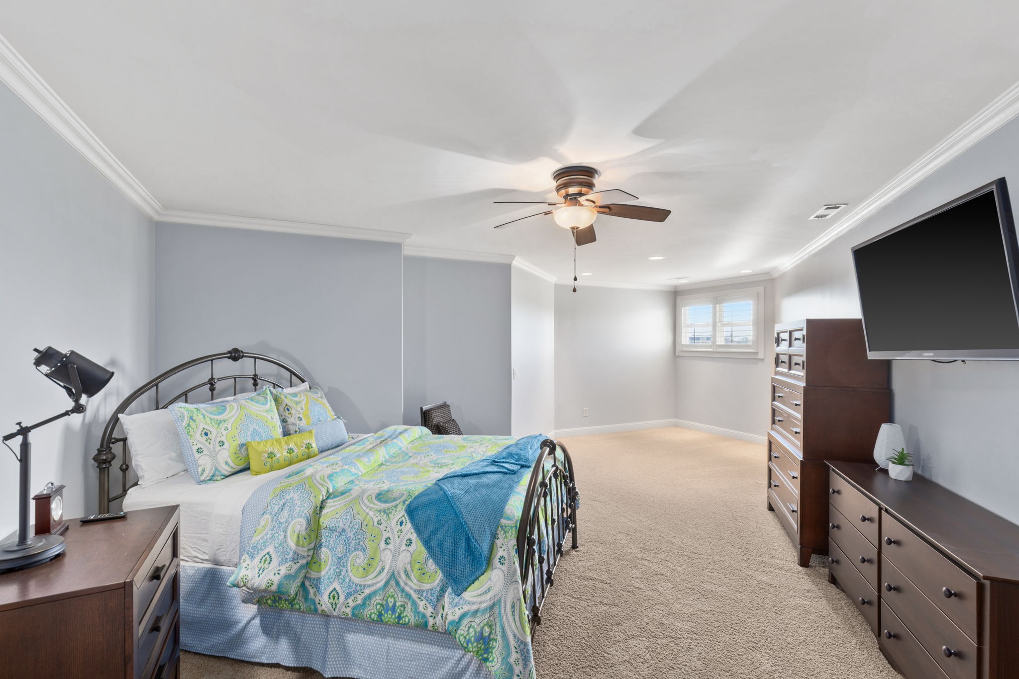 763 Plantation Way Gallatin, TN 37066 - Photo 43 of 65 a bedroom with a bed and a flat screen tv