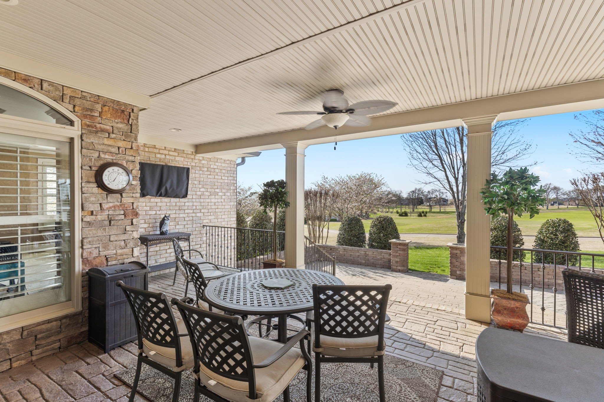 763 Plantation Way Gallatin, TN 37066 - Photo 45 of 65 a view of a patio with a dining table and chairs