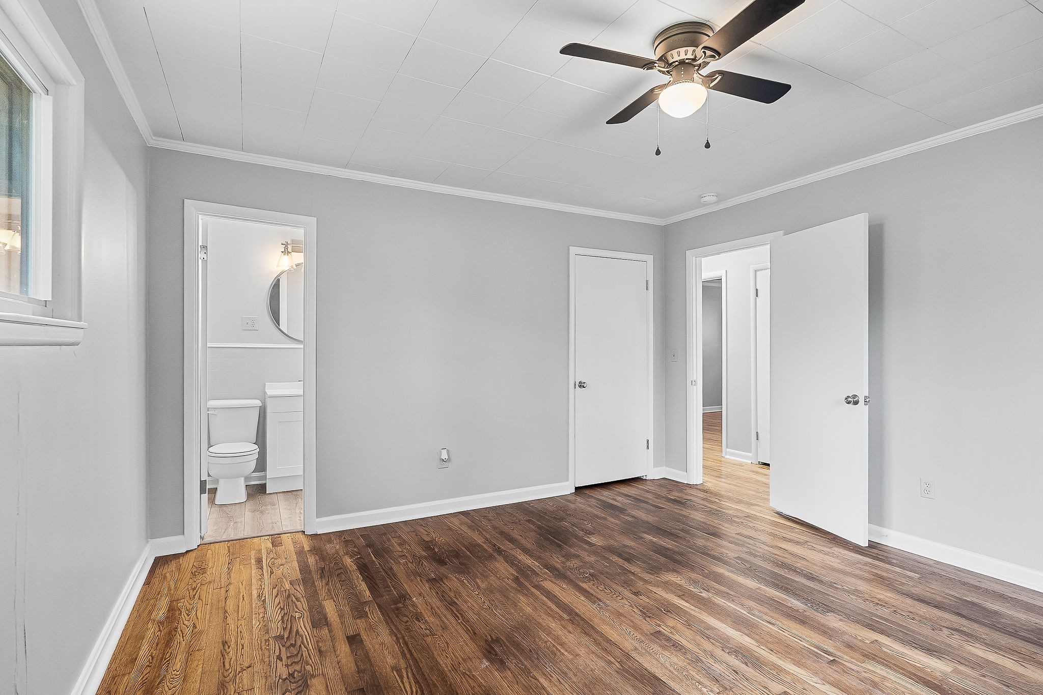 106 North Main Street Sparta, TN 38583 - Photo 15 of 28 a view of empty room with wooden floor and fan