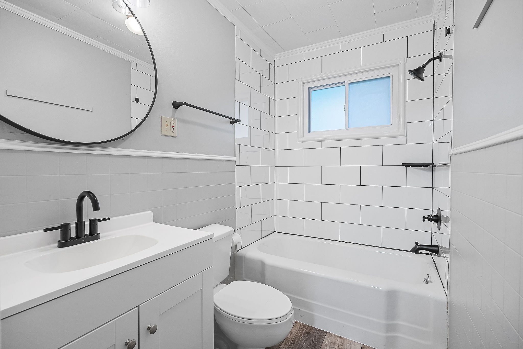 106 North Main Street Sparta, TN 38583 - Photo 20 of 28 a bathroom with a sink a toilet and a mirror