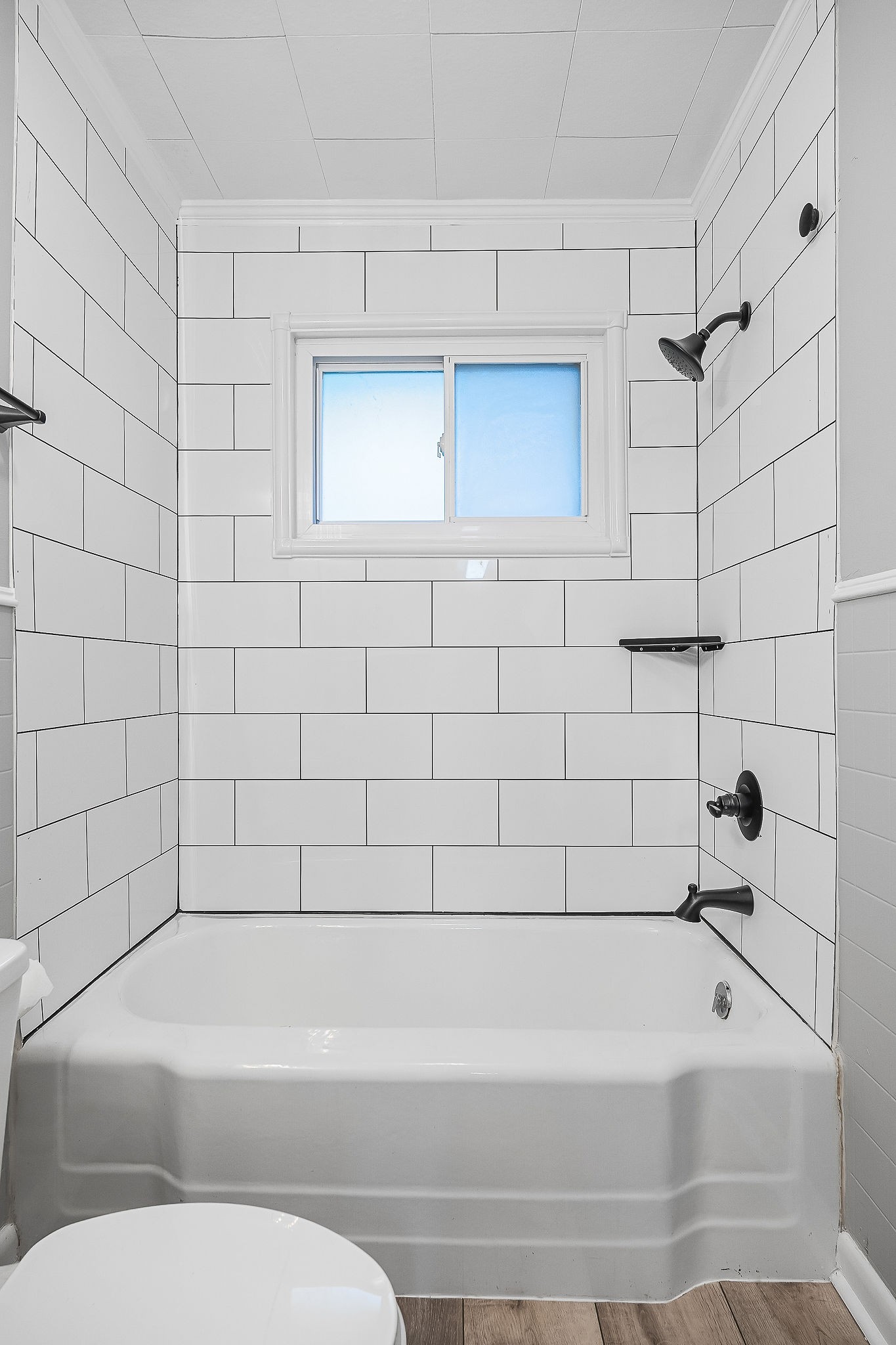 106 North Main Street Sparta, TN 38583 - Photo 21 of 28 a bathroom with a bathtub and a shower