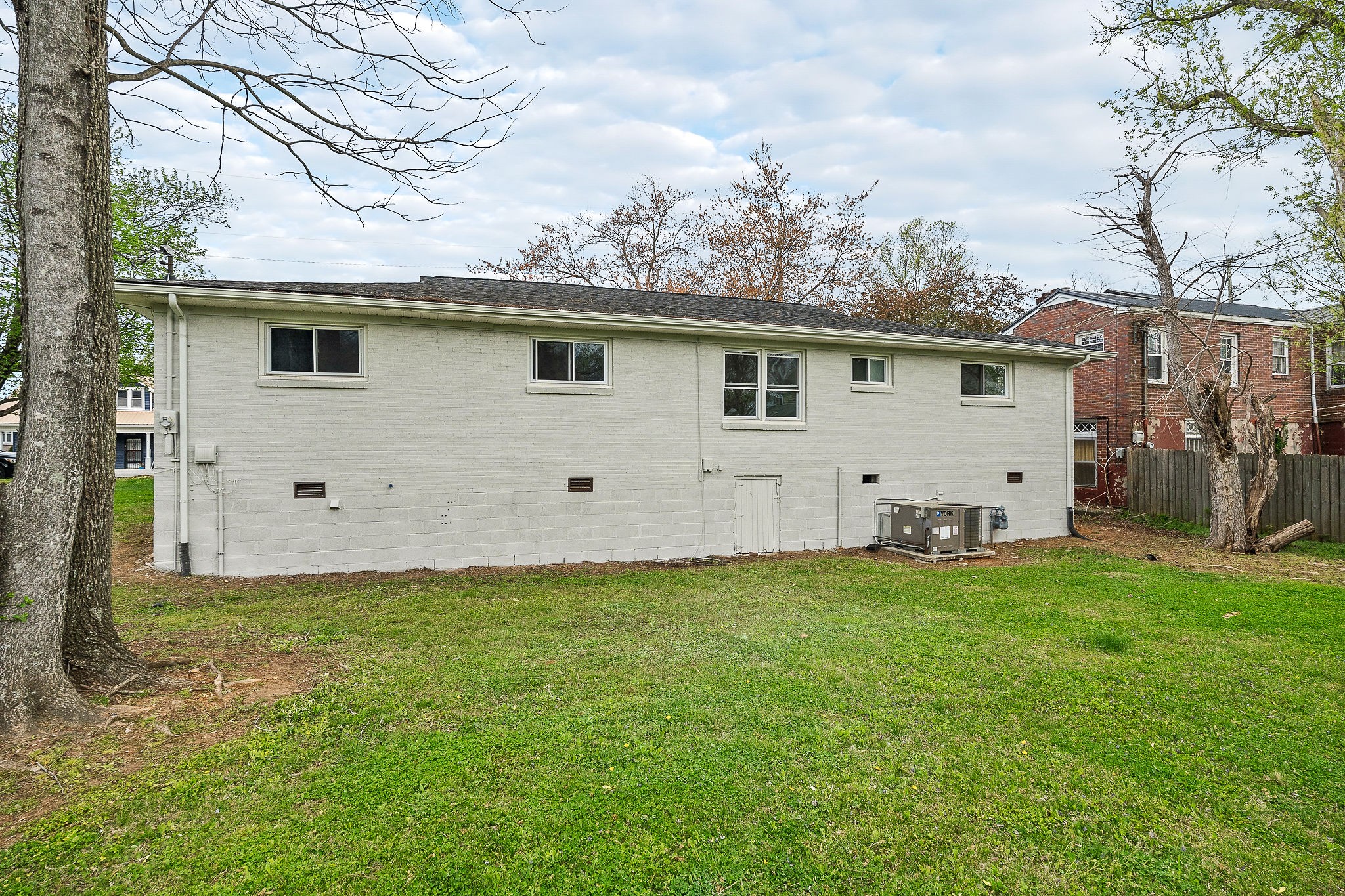 106 North Main Street Sparta, TN 38583 - Photo 25 of 28 a view of a house with a backyard
