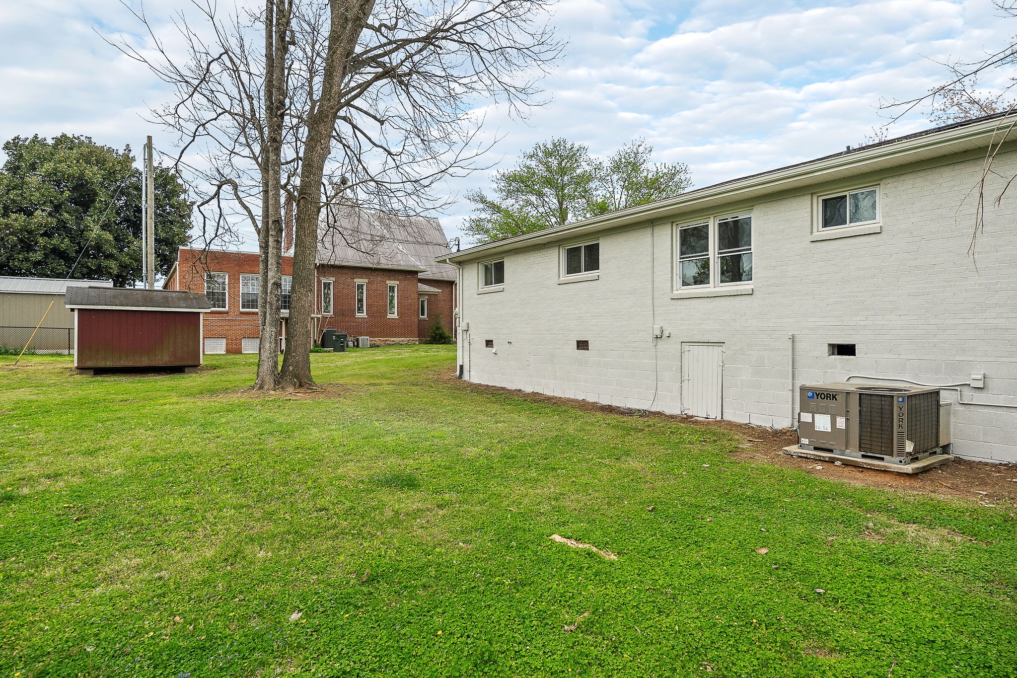 106 North Main Street Sparta, TN 38583 - Photo 26 of 28 a house view with a garden space