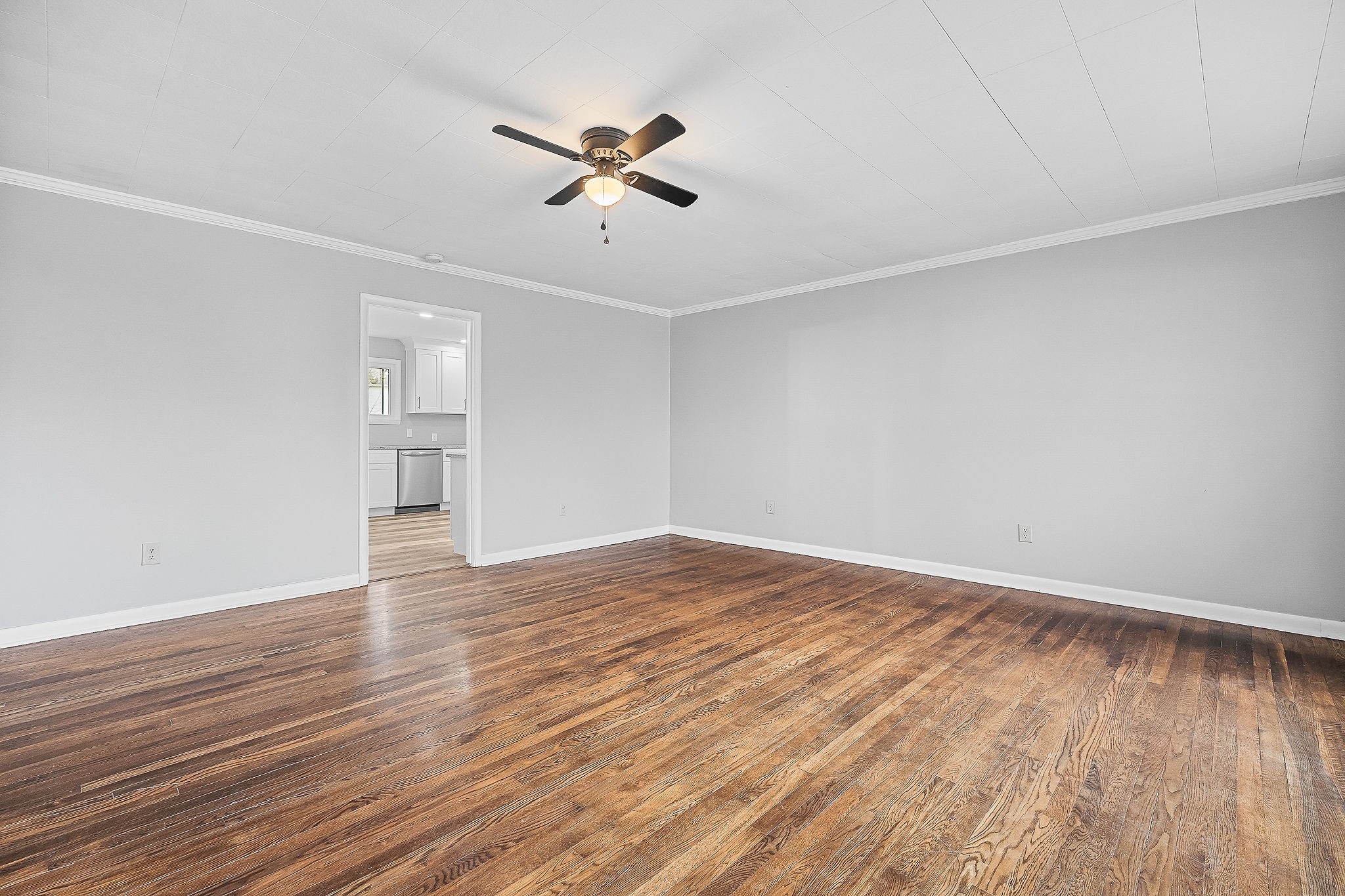 106 North Main Street Sparta, TN 38583 - Photo 5 of 28 a view of empty room with wooden floor and fan
