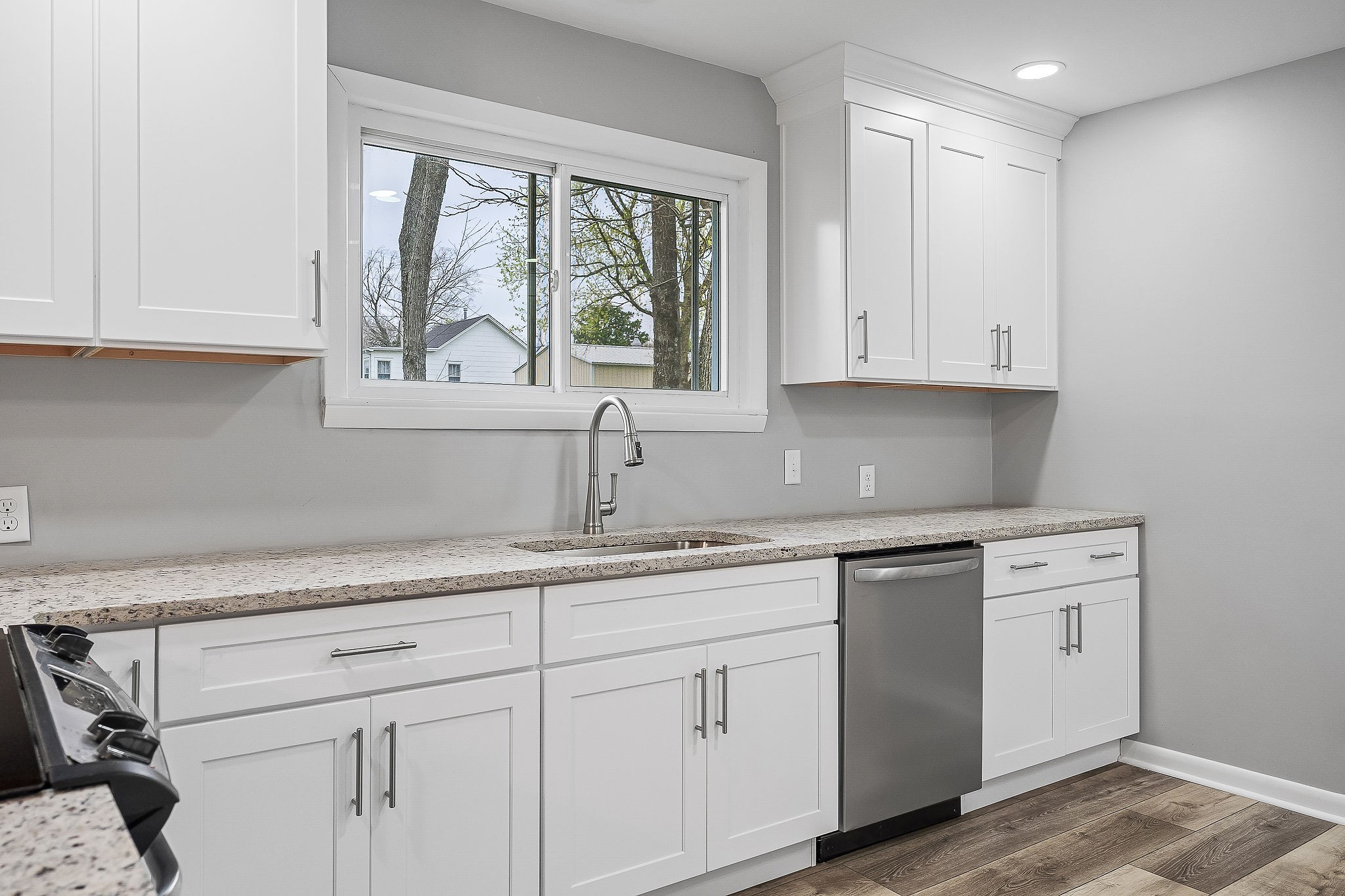 106 North Main Street Sparta, TN 38583 - Photo 10 of 28 a kitchen with appliances cabinets and a window
