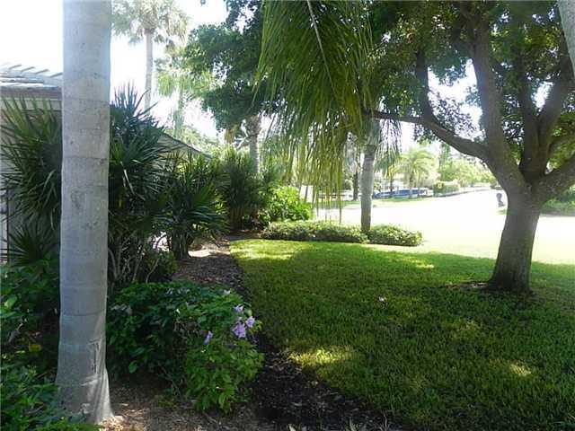 1 West High Point Road Sewall's Point, FL 34996 - Photo 16 of 20 a view of backyard with green space