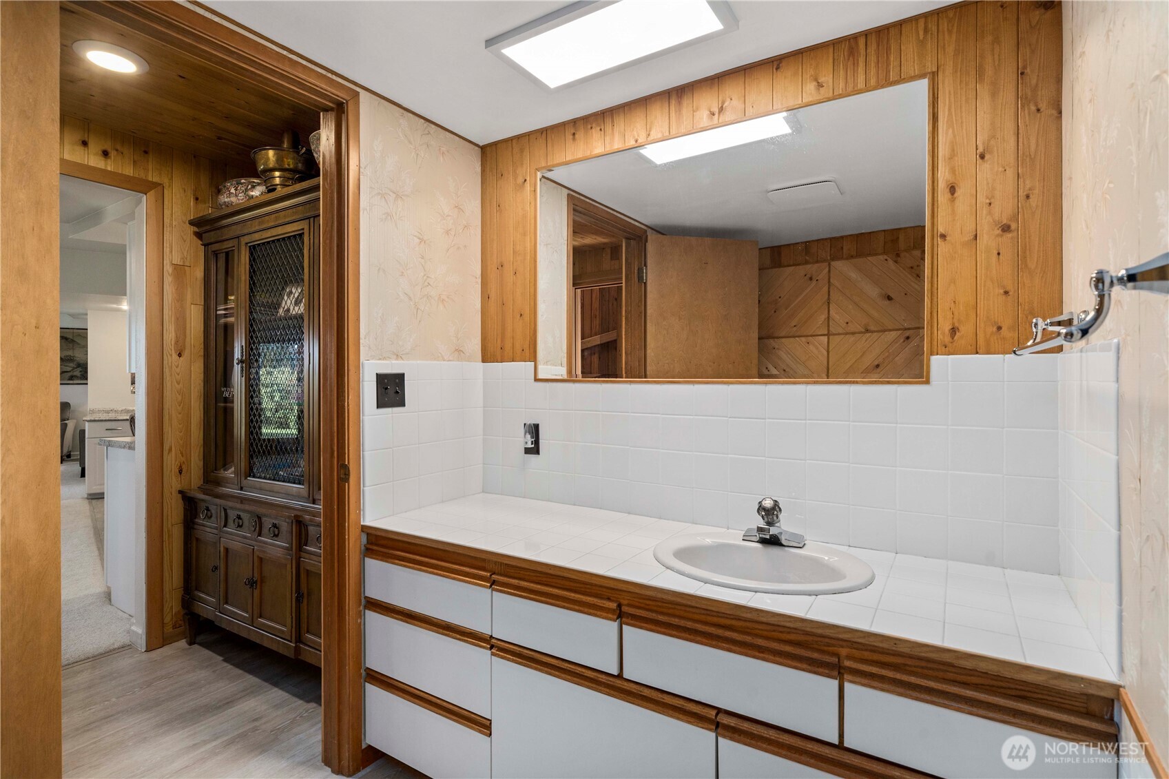 491 Bachelor Road Sequim, WA 98382 - Photo 28 of 39 a bathroom with a sink and a mirror