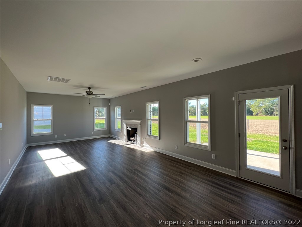 7810 Rufus Johnson Road St. Pauls, NC 28384 - Photo 6 of 18 a view of livingroom with window