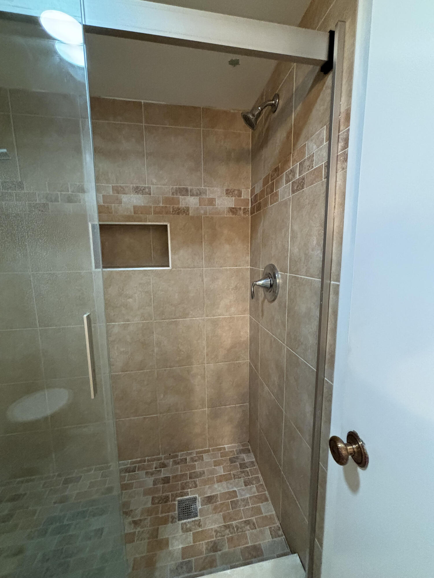 353 Highway 1, Unit A203 Jupiter, FL 33477 - Photo 20 of 26 a bathroom with a shower