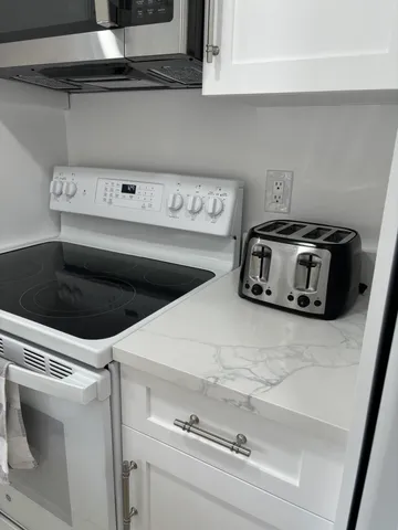 a view of a porch with hardwood floor
