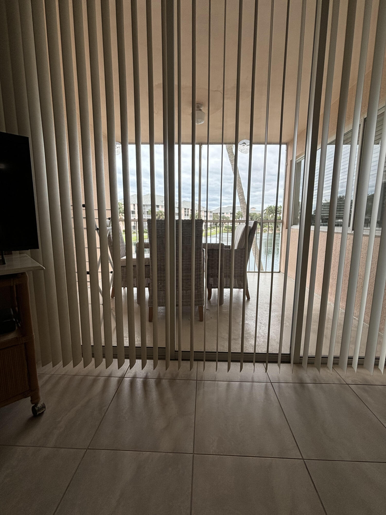 353 Highway 1, Unit A203 Jupiter, FL 33477 - Photo 25 of 26 a view of a porch with hardwood floor