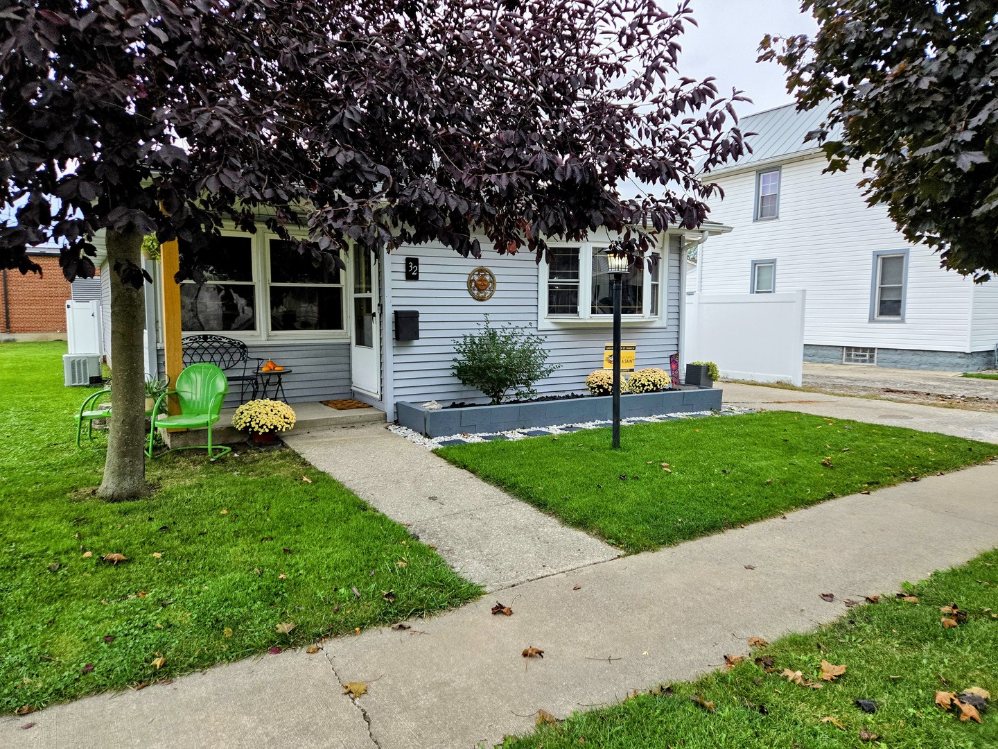 32 North Walnut Street Manteno, IL 60950 - Photo 2 of 11 a view of a house with backyard and a tree