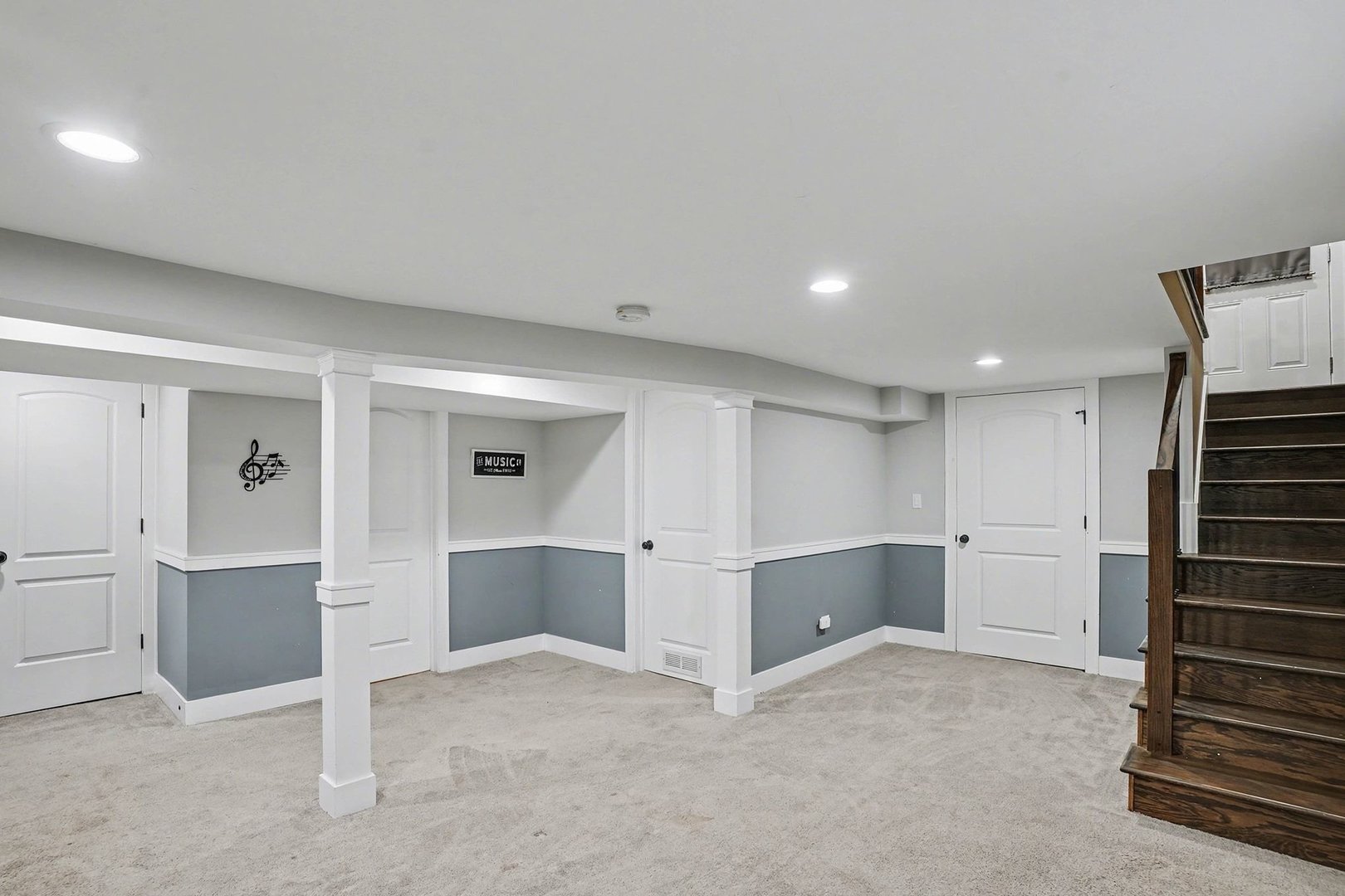 8953 South Aberdeen Street Chicago, IL 60620 - Photo 20 of 25 a view of a kitchen with white cabinets and wooden floor