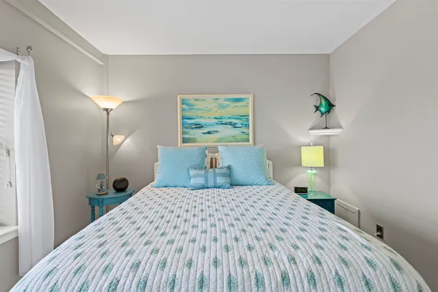 a bedroom with a bed and a closet