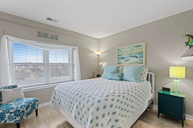 a bathroom with a sink a mirror a toilet and a mirror